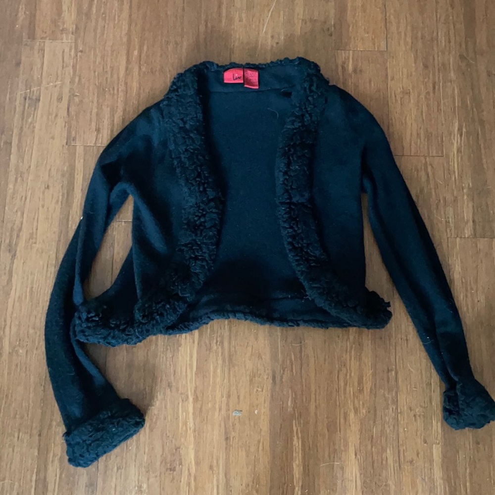 Black cardigan with fur trim by Liu